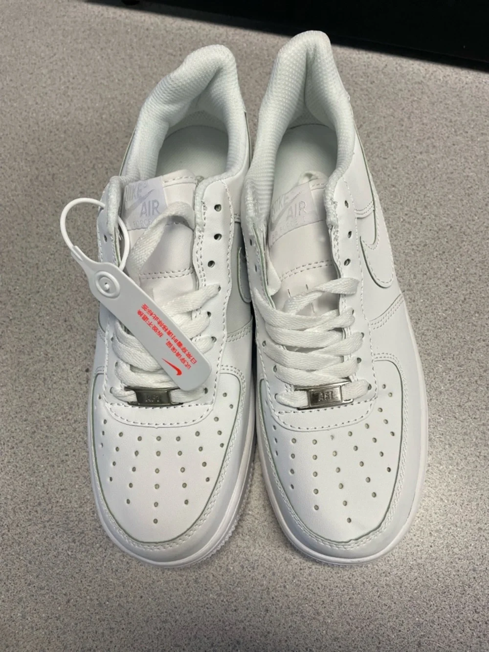 Nike All-White Leather Low-Top Sneakers